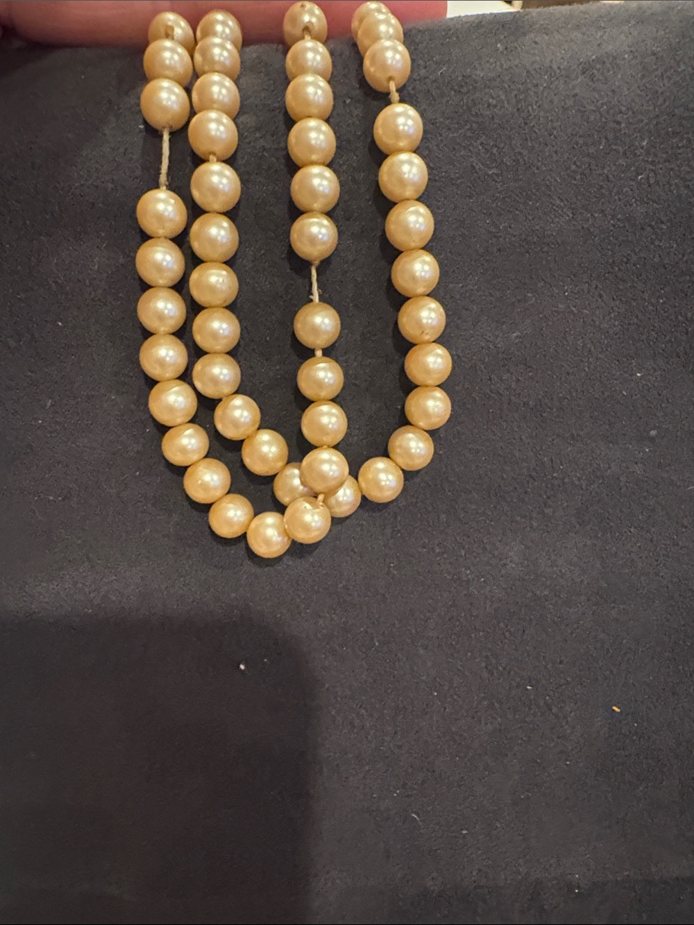 Gold-Tone Pearl Strand Necklace with Decorative Round Clasp